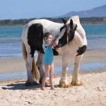 Tia with an admirer at the beach Our Tia and a little girl at Port Welhpool beach Victoria